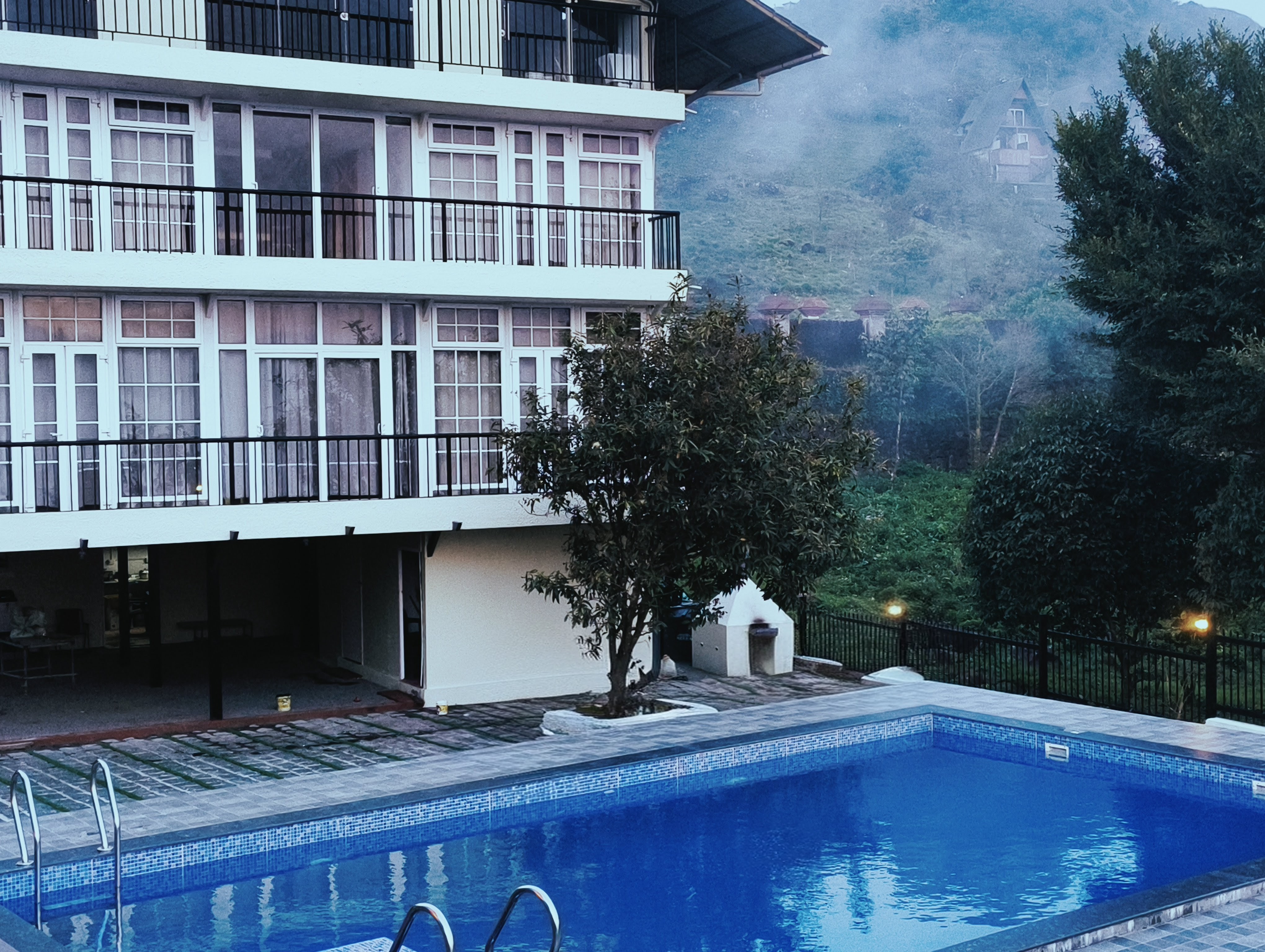 Swimming pool with mountain backdrop
